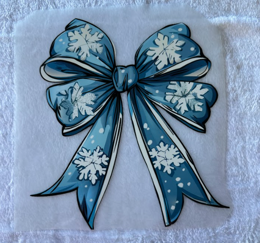 Blue bow with white snowflakes
